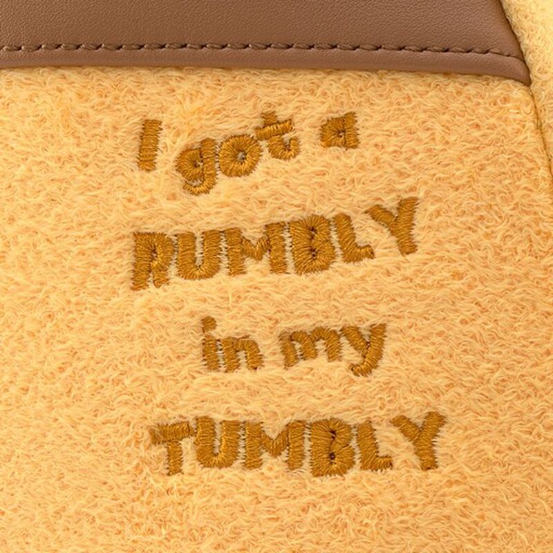 Embroidered I got a rumbly in my tumbly on a yellow fabric background with brown stitching.