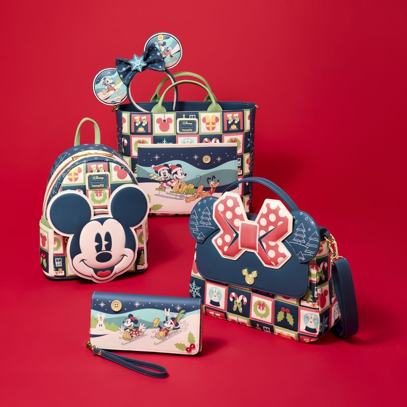 Set of Disney themed Loungefly Mickey Mouse Holiday bags and accessories on a red background