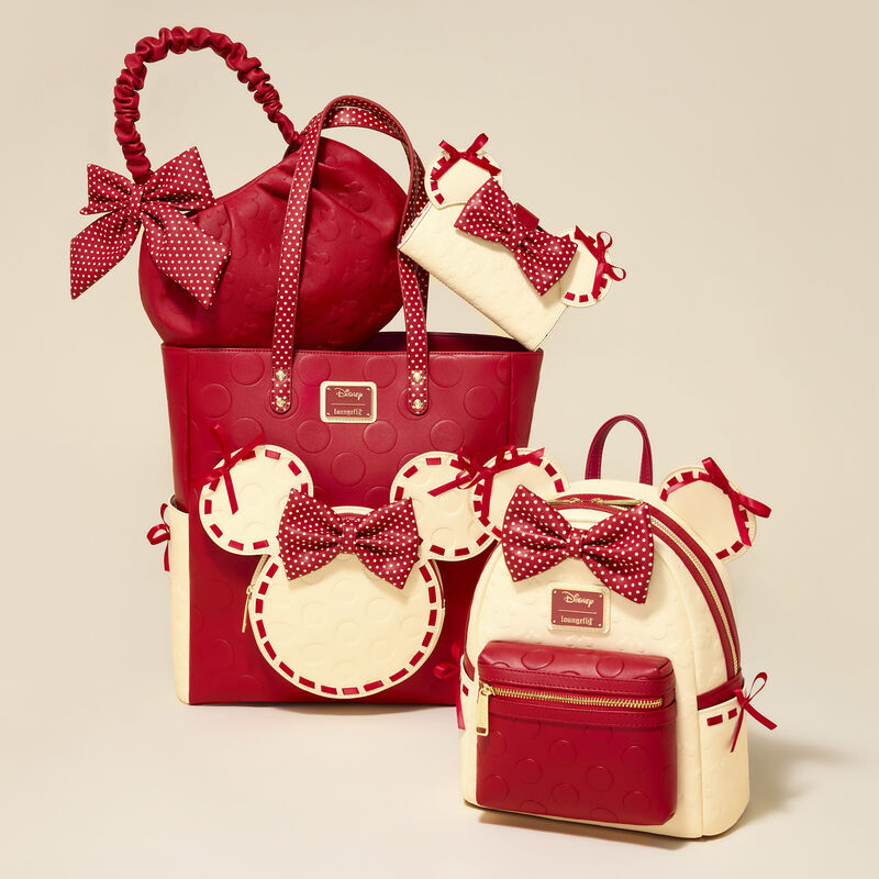 Minnie Mouse Rock the Dots Coquette Loungefly bag collection. Red and cream bags with bow details on a beige background