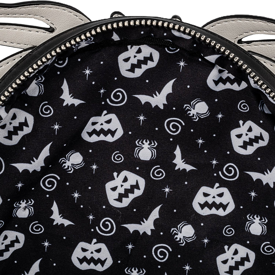 Black bag with white Halloween-themed patterns including pumpkins, bats, and ghosts.