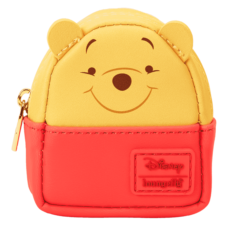 Small Winnie the Pooh Loungefly bag charm with red bottom on a white background