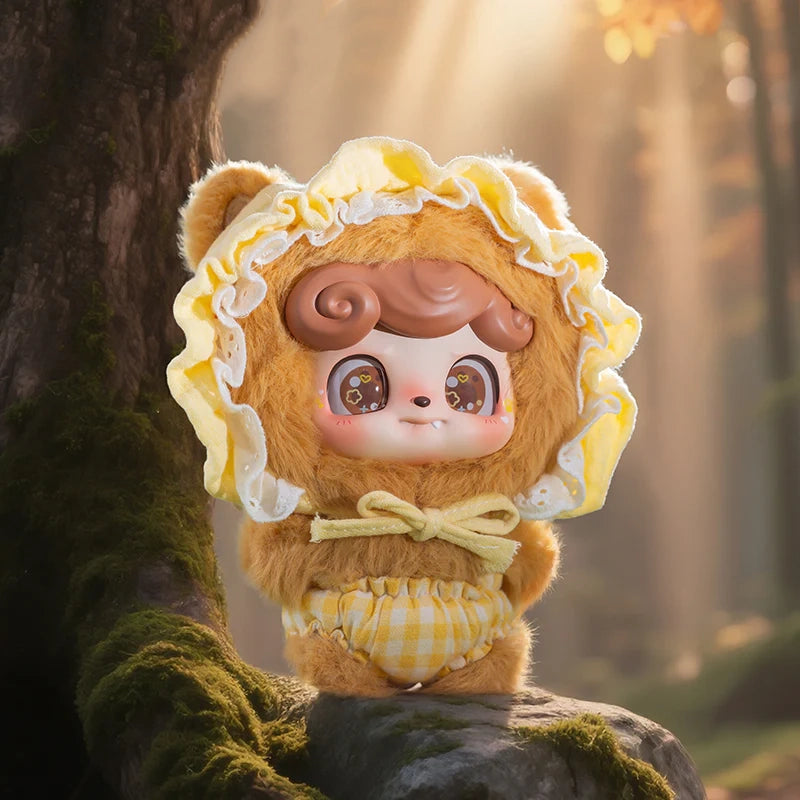 QKid fairy tales baby wolf in a yellow outfit standing on a rock in a forest setting