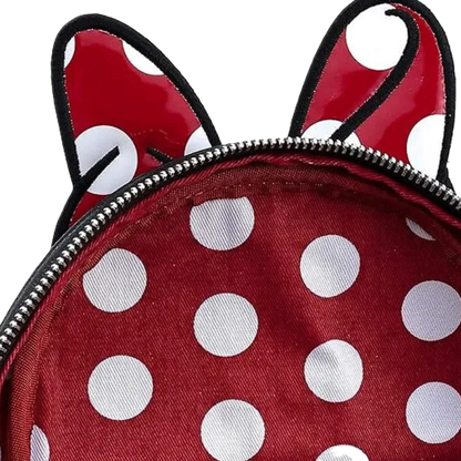 Red minnie mouse polka dot backpack with black straps on a white background