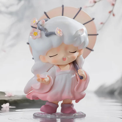 Cute yumo figurine with white hair and pink dress holding a fan, with cherry blossoms in the background.