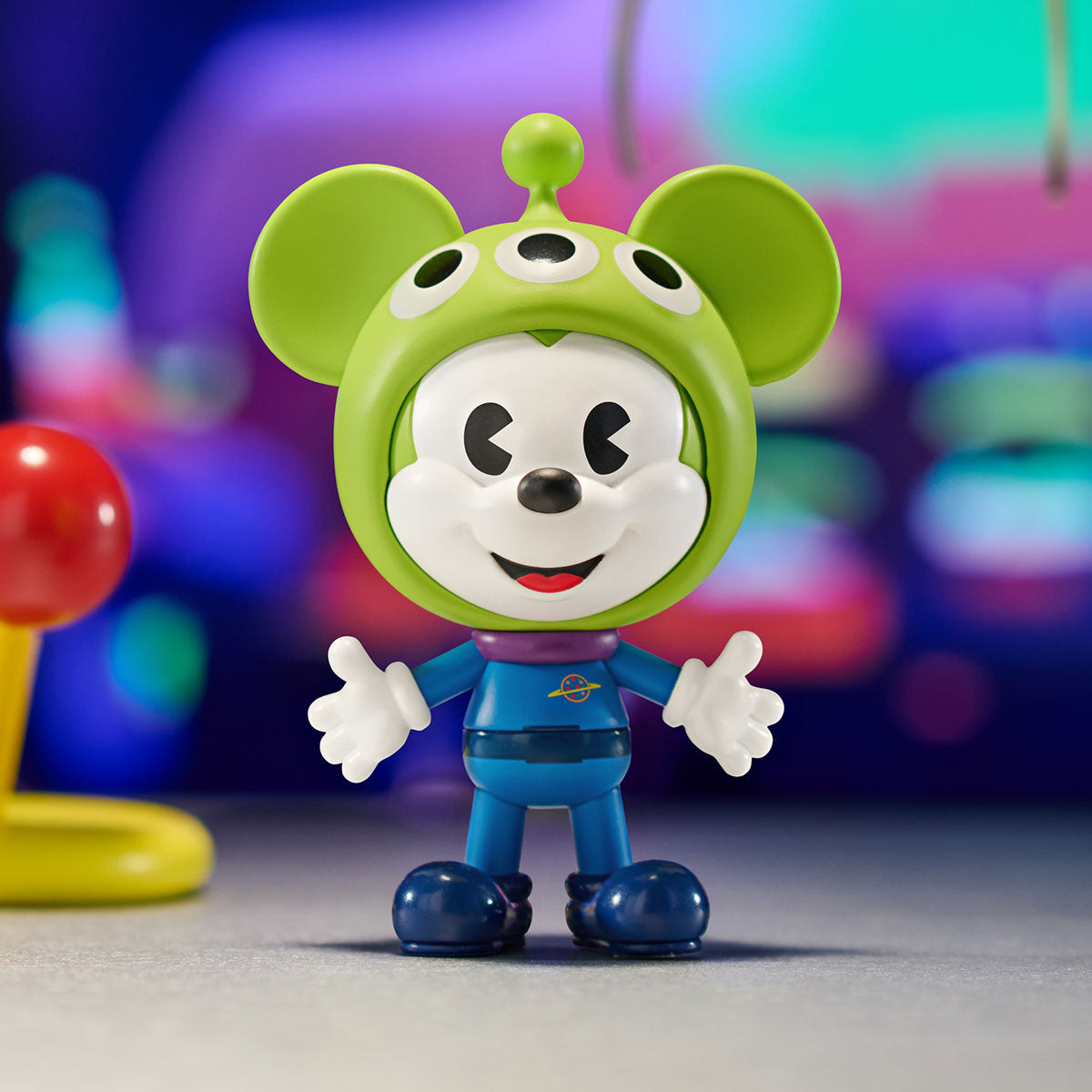 Disney Mickey Remixed: Mickey Meets Pixar Pop Mart Blind Box, with Mickey dressed as the alien from toy story on a colorful background