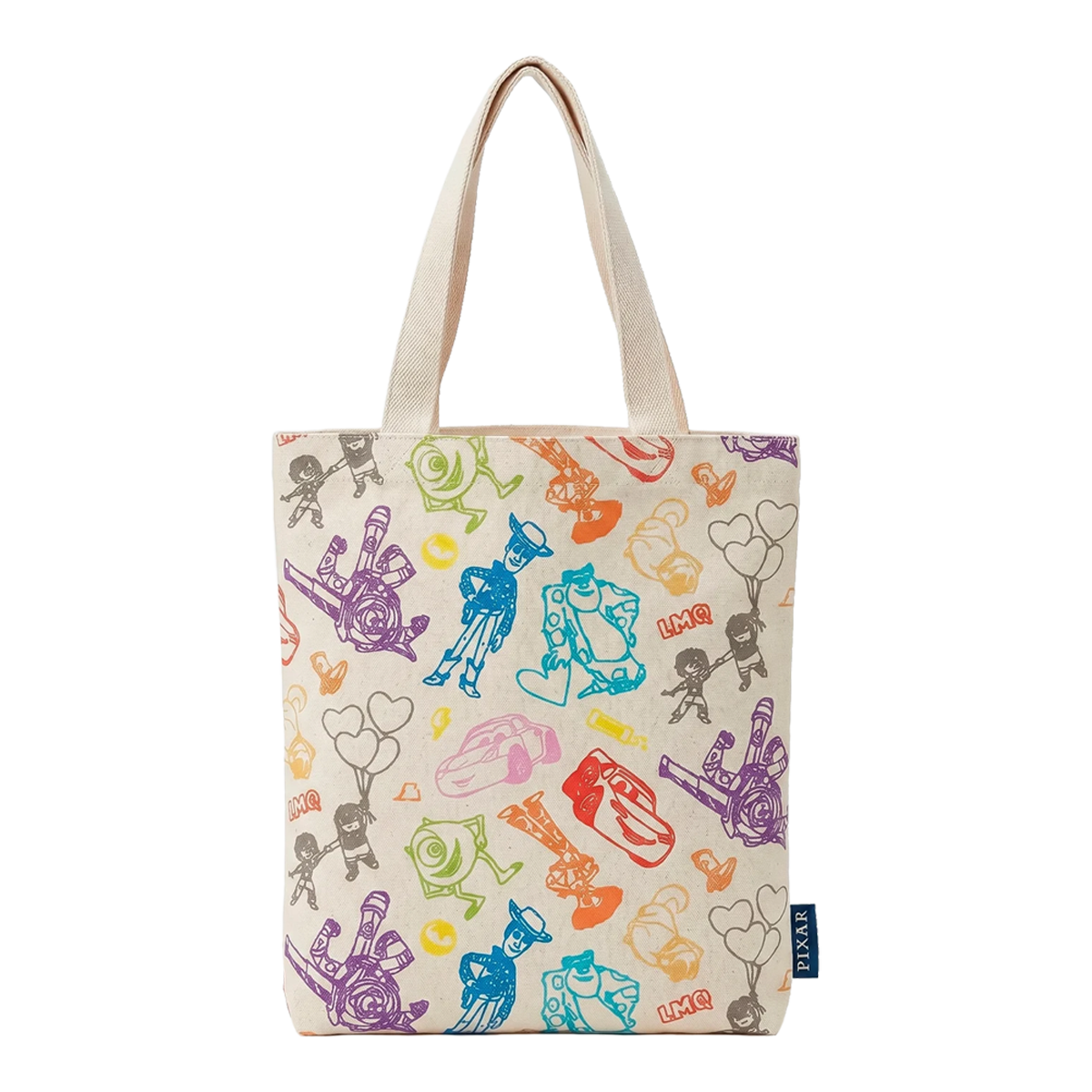 A cream canvas tote bag with a colorful all-over print of hand-drawn cartoon figures, balloons, and hearts, featuring dual cream canvas shoulder straps and a small navy blue brand tag on the lower right side.