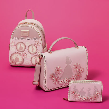 Set of pink Disney Princesses Loungefly bags with decorative patterns on a pink background
