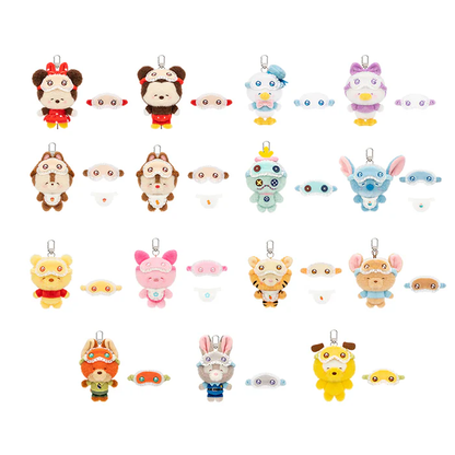 Collection of Disney squinting sleepwear blind box plush bag charms on a white background