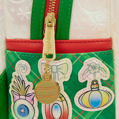 Green Loungefly bag with colorful designs and a gold christmas ball charm on a white background