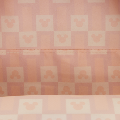 Checkered pattern with a stylized mickey silhouette design on a pink background