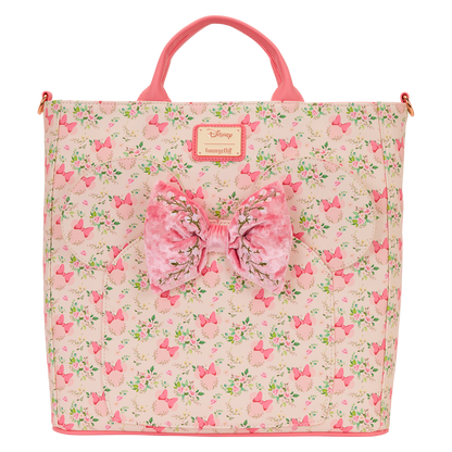 Pink floral Minnie Mouse Loungefly bag with a large bow on a white background
