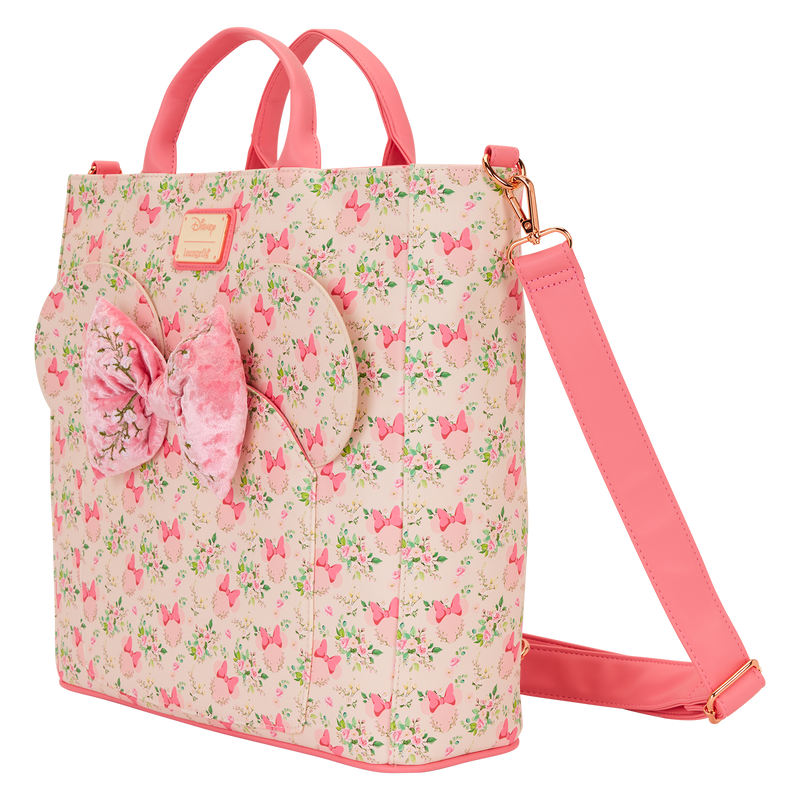 Pink floral Minnie Mouse Loungefly crossbody bag  with a bow on a white background