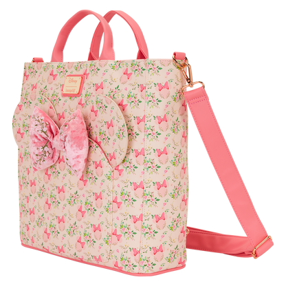 Pink floral Minnie Mouse Loungefly crossbody bag  with a bow on a white background
