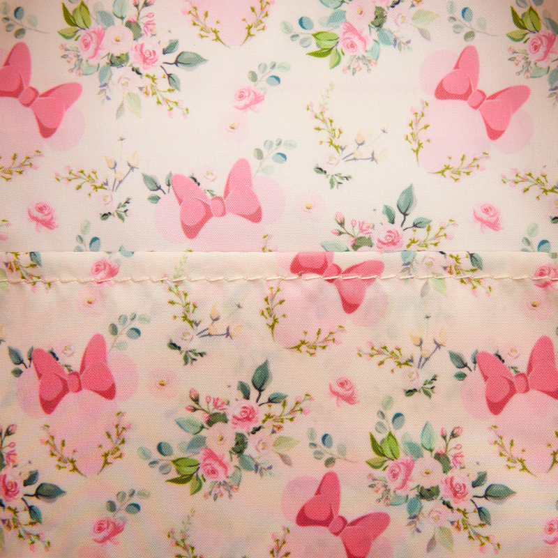 Floral Minnie Mouse Loungefly pattern with pink bows on a light background