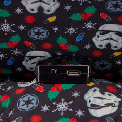 Loungefly backpack Star Wars-themed fabric lining with stormtrooper helmets, lightsabers, and Christmas elements.
