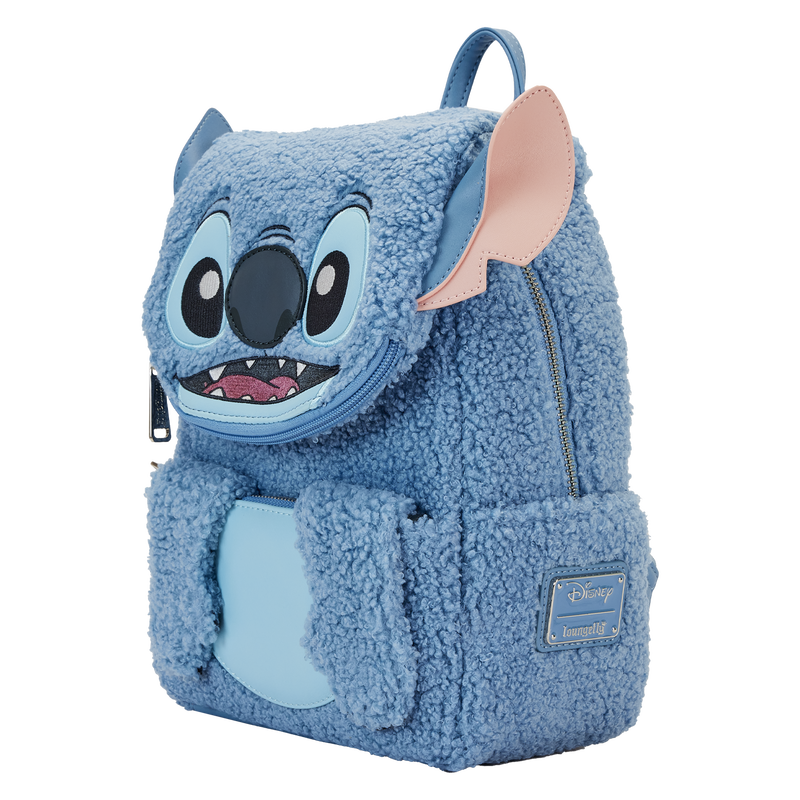 Blue plush Loungefly backpack shaped like Stitch with a white background