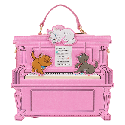 Pink piano-shaped handbag with Aristocats characters on a white background