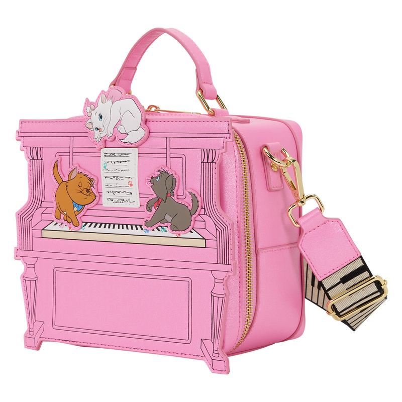 Pink piano-shaped handbag with aristocats characters on a white background