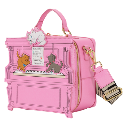 Pink piano-shaped handbag with aristocats characters on a white background