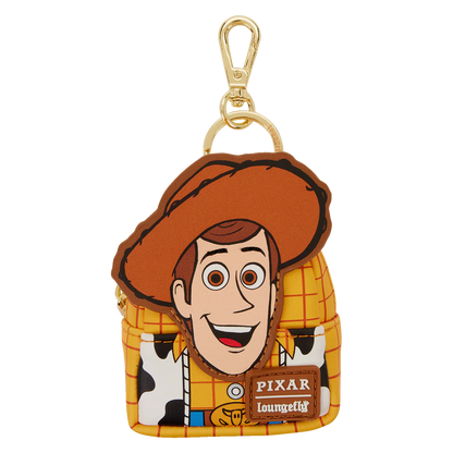 Loungefly Woody shaped bag charm from Pixar with a smiling face and cowboy hat.