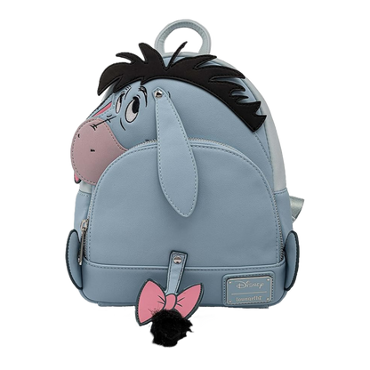 Loungefly backpack designed like Eeyore from Winnie the Pooh with a pink bow, on a white background
