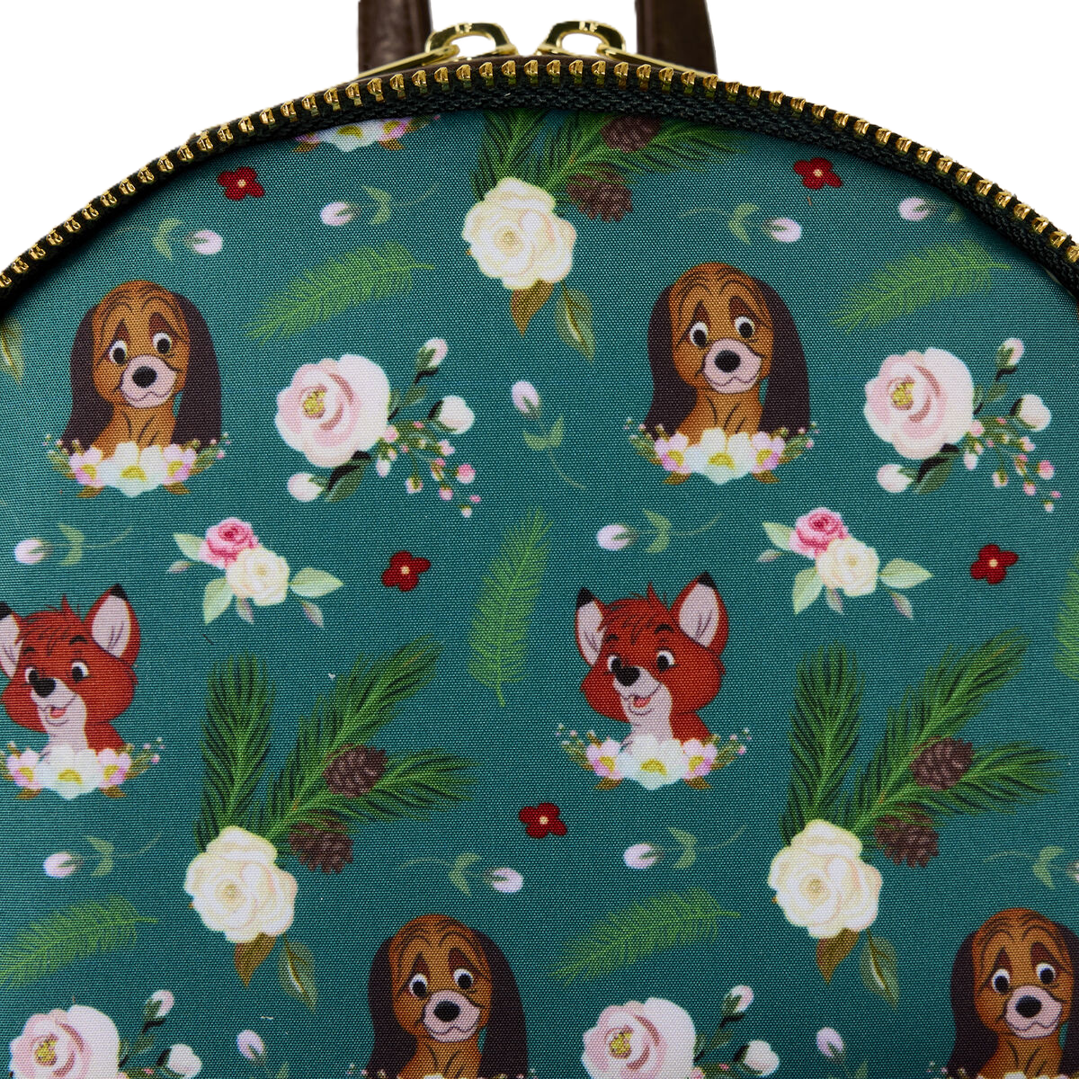Patterned fabric with Disney animals and flowers on a teal background