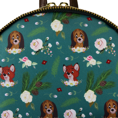 Patterned fabric with Disney animals and flowers on a teal background
