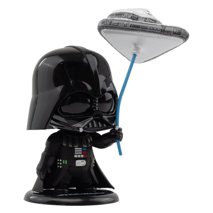 Darth Vader figurine holding a lightsaber with a white background